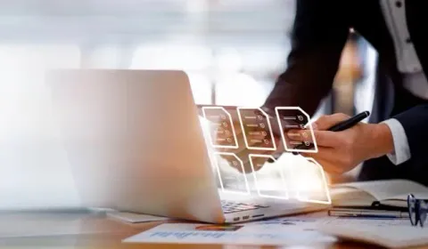 A laptop screen showing a digital invoice and tax compliance checklist