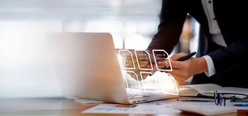 A laptop screen showing a digital invoice and tax compliance checklist